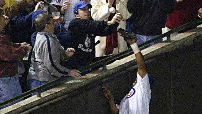 Chicago Cubs fan Steve Bartman reached over the fence in 2003 and cost a Cubs player a catch on a foul ball.