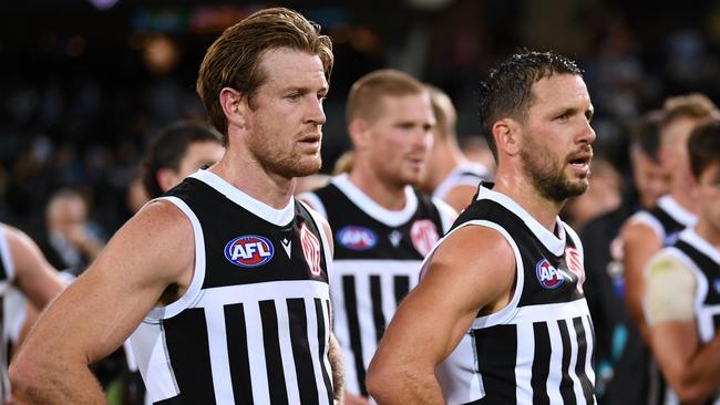 ADELAIDE, AUSTRALIA - APRIL 01:Tom Jonas and Travis Boak of Port Adelaide  dejiected after losing  the round three AFL match between Port Adelaide Power and Adelaide Crows at Adelaide Oval, on April 01, 2023, in Adelaide, Australia. (Photo by Mark Brake/Getty Images)