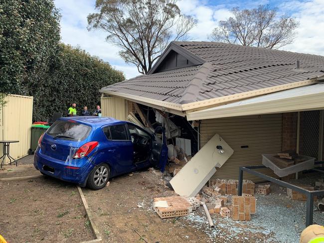 MOUNT ANNAN, NSW - Shortly after 12:45pm on June 27, 2022 NSW Ambulance paramedics were called to reports that a car had crashed into a house on McEwan Circuit, Mount Annan. Picture: NSW Ambulance