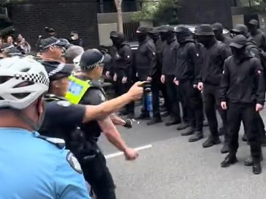 Police confront a group of suspected neo-Nazi at a pro-refugee rally. Picture: TikTok/permanentvisaforrefugees