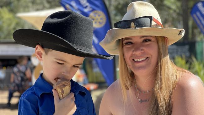 Levi and Tiffany Cornish, from Oakey, enjoy day one of the 2024 Gympie Muster, at the Amamoor State Forest on August 22, 2024.