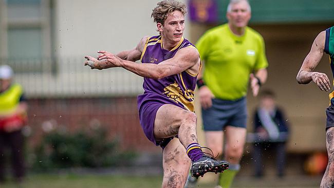 Daniel Orgill boots Collegians forward last year.