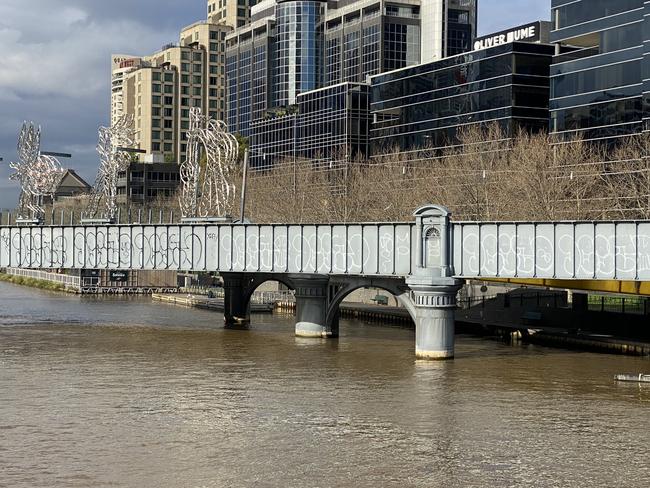 Graffiti on the Sandridge Bridge over the Yarra River Picture: Craig McIntosh