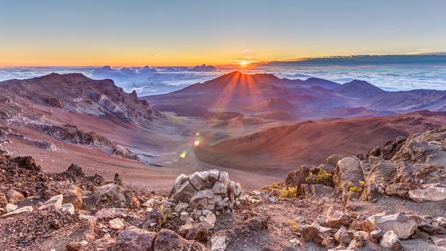 sunrise from the summit of Haleakala volcano on the tropical island of Maui, Hawaii