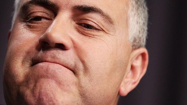 CANBERRA, AUSTRALIA - SEPTEMBER 16: Treasurer Joe Hockey speaks to the media during a press conference with ATO Commissioner of Taxation Chris Jordan at Parliament House on September 16, 2015 in Canberra, Australia. Malcolm Turnbull was sworn in as Prime Minister of Australia on Tuesday, replacing Tony Abbott following a leadership ballot on Monday night. (Photo by Stefan Postles/Getty Images)