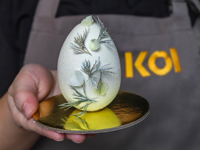 The gorgeous white Easter egg has mango filling inside. Picture: Jenifer Jagielski