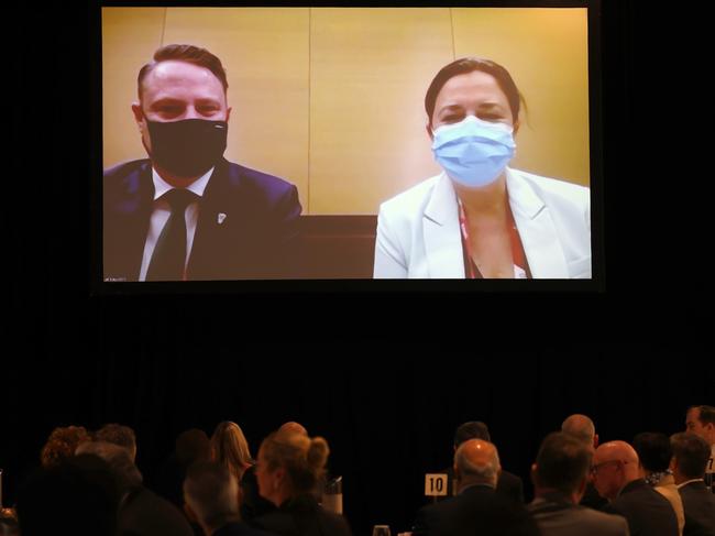 Lord Mayor Adrian Schrinner and Premier Annastacia Palaszczuk during a live cross from Tokyo to the Premier's Olympics Breakfast at the Gabba in Brisbane