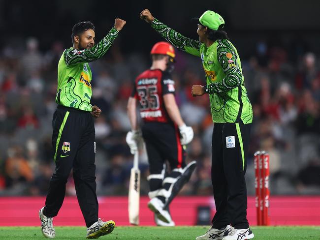 The Sanghas, Tanveer and Jason (left and right) both play for Sydney Thunder. Picture: Mike Owen/Getty Images