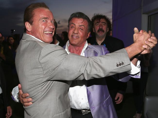 CANNES, FRANCE - MAY 18:  Actors Arnold Schwarzenegger and Sylvester Stallone attend The Expendables 3 Official Cast Dinner Party at Gotha Club on May 18, 2014 in Cannes, France.  (Photo by Gisela Schober/Getty Images)