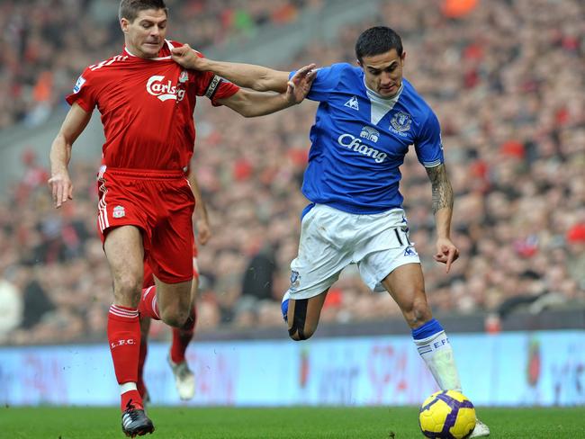 Tim Cahill fends off Liverpool’s Steven Gerrard at Anfield in 2010. Picture: AFP