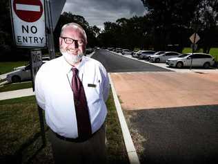 PICTURE: Trinity Catholic College principal Brother John in front of Brunswick St which the Catholic church is proposing to buy. Picture: Marc Stapelberg