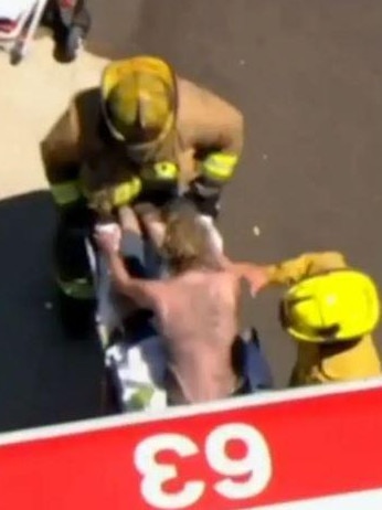 Footage from the scene saw her writhing in pain on an ambulance stretcher. Picture: Fox 11