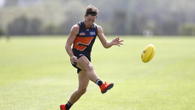 Toby Greene in full flight at training after an injury-interrupted pre-season