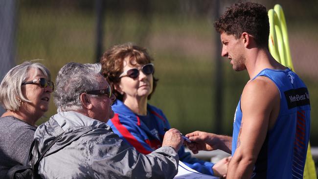 Tom Liberatore enjoys signing autographs and racking up Supercoach points. Picture: Michael Dodge/Getty Images. 