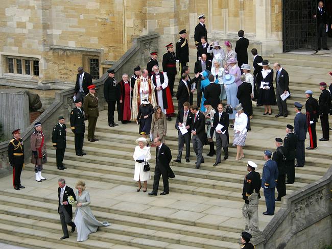 Prince Charles and the Duchess of Cornwall, Camilla, walk from St George’s Chapel at Windsor Castle followed by Queen Elizabeth, Prince Philip and members of the Royal family, after their blessing and civil wedding in 2005. Picture: (Odd Andersen via AP