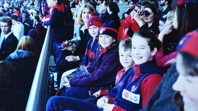 Neale Daniher's children at a footy match when they were young.