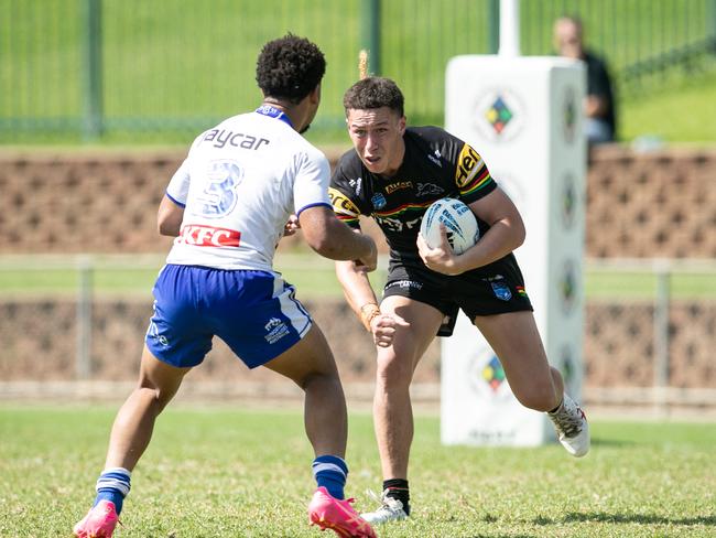 Preston Talamaivao charges at Chinedu Udeh. Picture: Julian Andrews