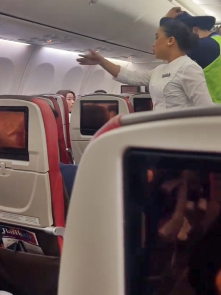 Cabin crew members were carrying out a safety check prior to take-off when they spotted a woman without hers on. Picture: Jam Press