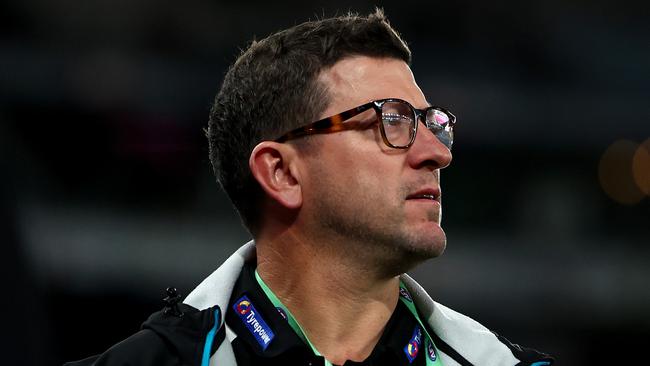 MELBOURNE, AUSTRALIA - JUNE 30: Josh Carr, the assistant coach of the Power looks on during the round 16 AFL match between St Kilda Saints and Port Adelaide Power at Marvel Stadium, on June 30, 2024, in Melbourne, Australia. (Photo by Quinn Rooney/Getty Images)