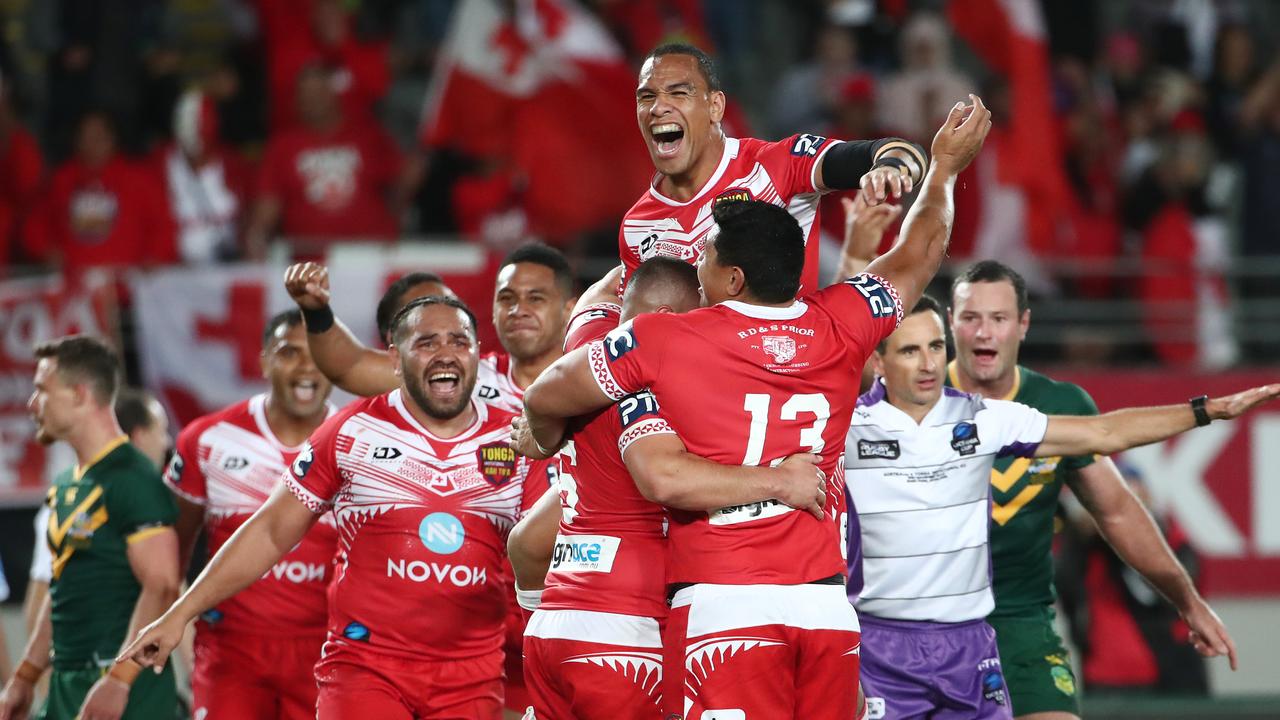 Tonga celebrate their win over Australia