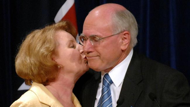 John Howard gets a kiss from wife Janette as he concedes defeat in the 2007 federal election. Photo: Jeremy Piper