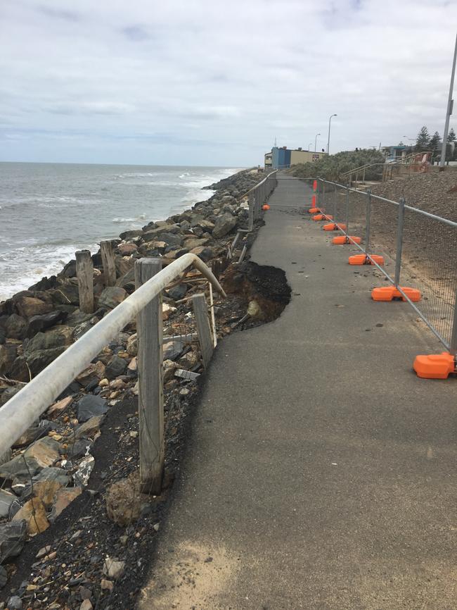 The rock wall and coastal path at West Beach, which has been closed off, was severely damaged by storms in May 2016. Pic: Patrick Keam.