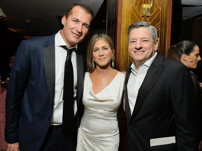 Netflix executive Scott Stuber with Jennifer Aniston and Chief Content Officer Ted Sarandos at Sunset Tower. Picture: Getty Images for Netflix