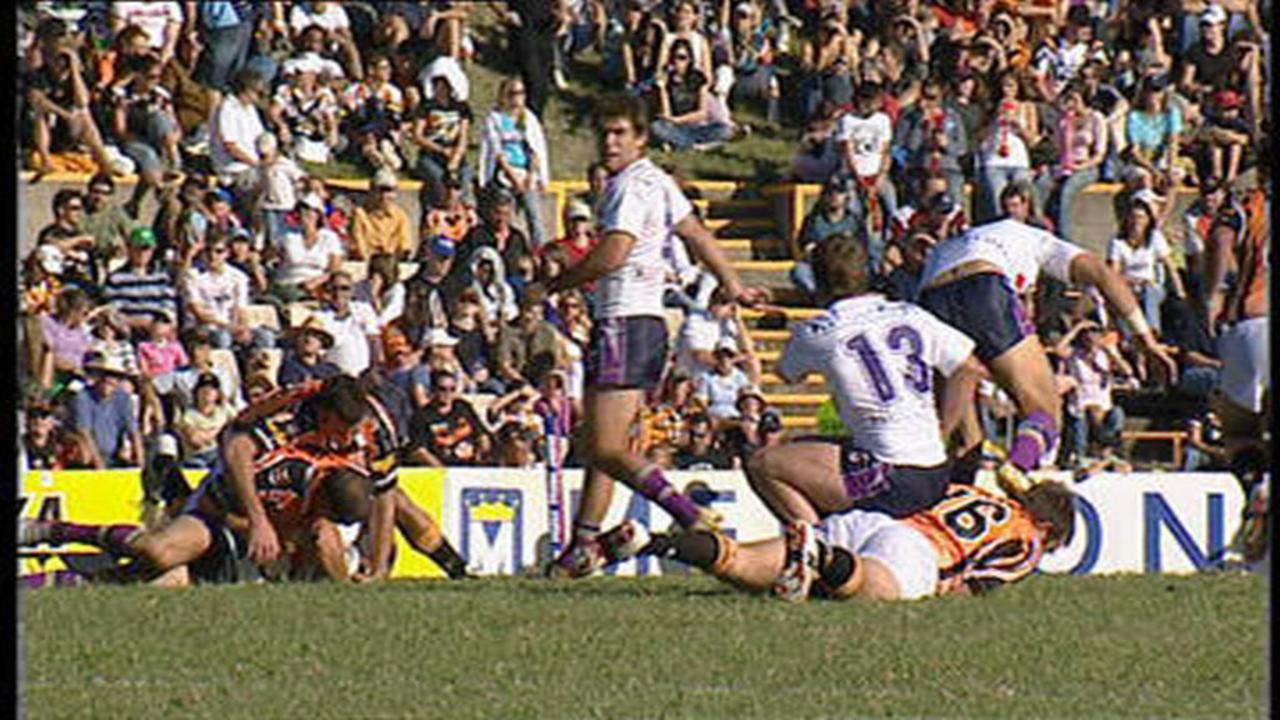 Billy Slater faced a grade-five kicking charge and seven games on the sidelines for this incident involving Tigers forward John Skandalis in 2006. Pic Fox Sports.