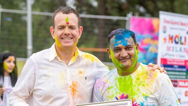 Stephen Lawrence presenting certificate and token of Gift to Twinkal Rupareliya from Rams International Grocer. Photo: Wade Holmes at On A Good Day Photography