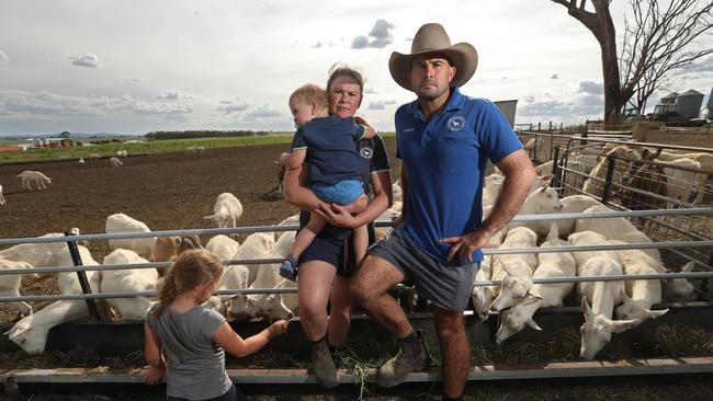 Safety fears: Marcus and Shannan Jessen, with young son Daniel, faced angry activists on their property Cranley Park a goatdairy farm, at Allora, south of Toowoomba, in Queensland. The couple were forced to sleep in their machinery shed out of fearanimal activists would keep invading. Picture: Lyndon Mechielsen