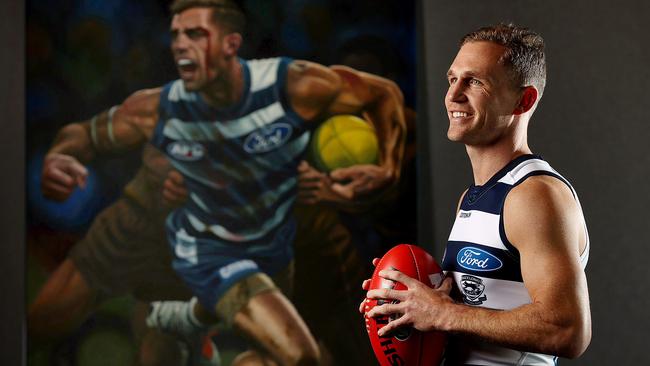 Joel Selwood with a Jamie Cooper painting of himself before he plays his 300th game on the weekend. Picture: Michael Klein