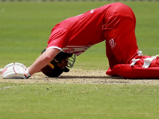 SYDNEY, AUSTRALIA - DECEMBER 18: English cricketer Mark Stoneman reacts after being injured during round 7 of the Belvidere Cup First Grade NSW Premier Cricket between Eastern Suburbs and St George at Waverley Oval on December 18, 2021 in Sydney, Australia. (Photo by Jeremy Ng/Newscorp Australia)