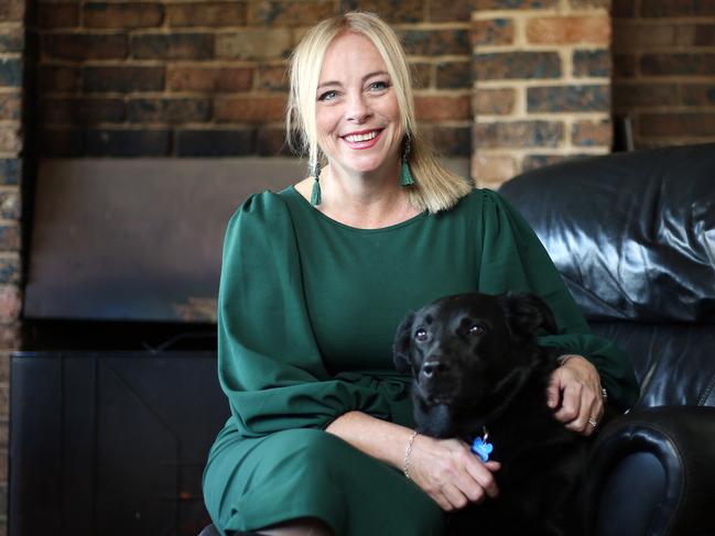 Author Mary-Anne O'Connor with her dog Saxon at home. Picture: Tim Hunter.