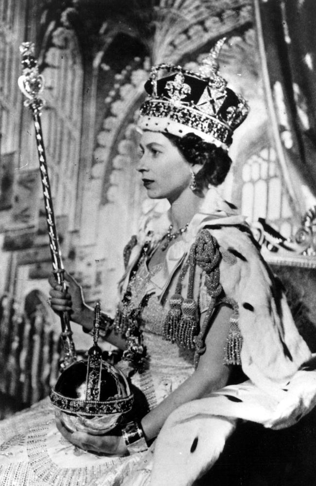 The Queen is seated here in the Throne Room at Buckingham Palace after her coronation in Westminster Abbey. Picture: Keystone Press Agency/Alamy