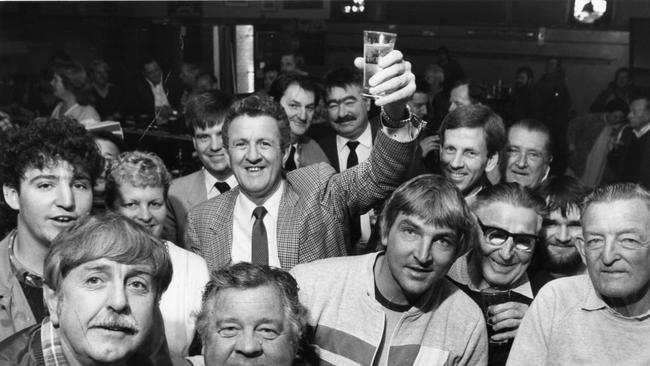 CHEERS: Minister for Immigration and Ethnic Affairs, Mick Young, enjoying a beer with his mates at the Hotel Osborne on his final day of campaigning for Federal election campaign, 10 Jul 1987. Future SA Labor MPs Kevin Foley, at his left, and Michael Wright, at his right.