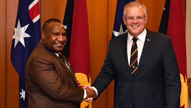 Prime Minister Scott Morrison greets Papua New Guinea's Prime Minister James Marape at Parliament House. Picture: AFP