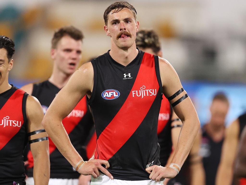 Joe Daniher and disappointed teammates.