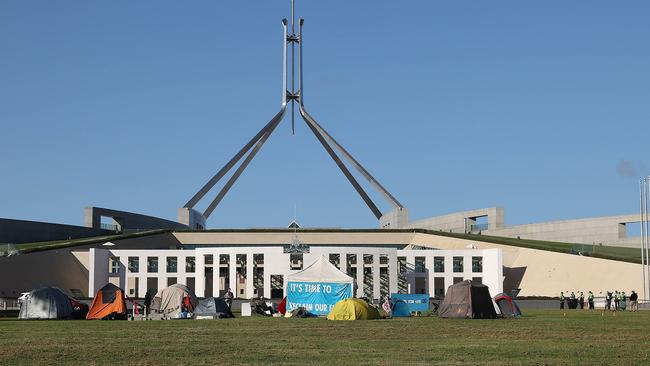 Climate change protesters set up a tents on the lawns of Parliament House in Canberra. Picture: NCA NewsWire / Gary Ramage