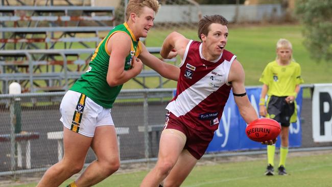 Traralgon’s Tye Hourigan breaks away from Leongatha’s Jenson Garnham earlier this year. Picture: Daniel Heathcote.