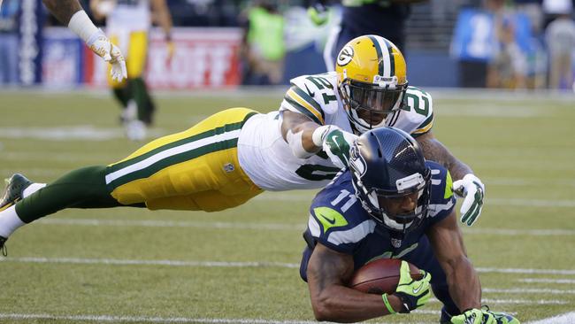 Seattle Seahawks wide receiver Percy Harvin dives for yet another pass reception.
