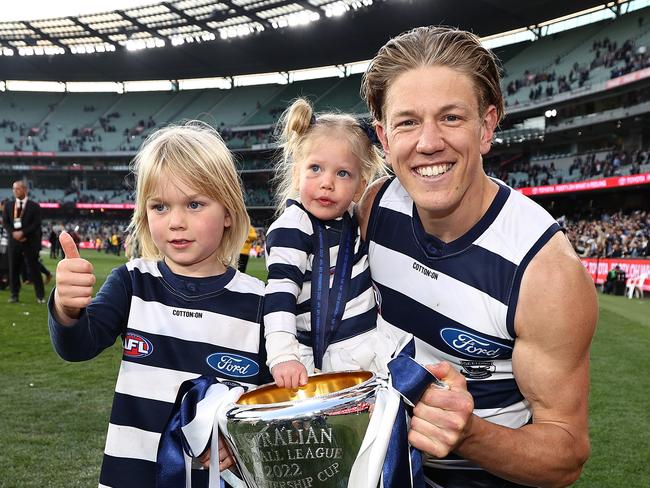 Rhys Stanley with two of his children after their premiership win. Picture: Michael Klein