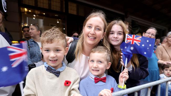 Kristyn Cherrett with kids L to R, Lucas, Jacob, Ammaleah, from Warner Brisbane, watching Dad march as Part of 8/9 RAR. Photo: Steve Pohlner