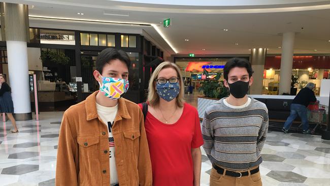 Donna Peters with her sons Riley and Darcy at Westfield Garden City on Saturday. Picture: Attila Csaszar