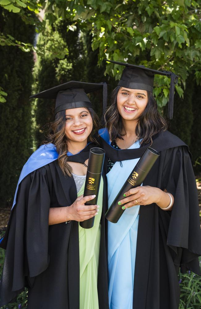 Bachelor of Nursing graduates Anusha Chaudhary (left) and Santoshi Dhungana at a UniSQ graduation ceremony at Empire Theatres, Tuesday, October 31, 2023. Picture: Kevin Farmer