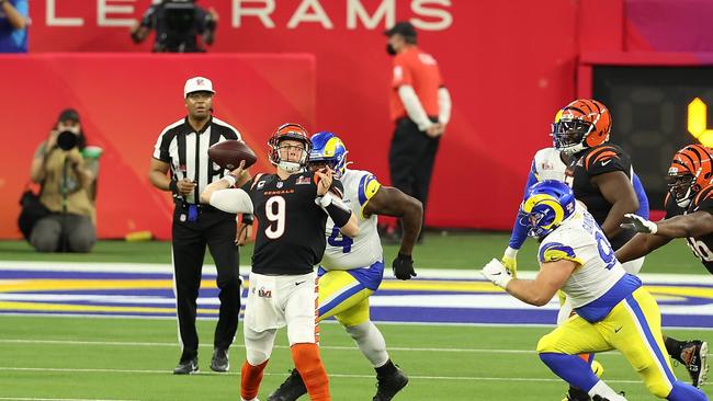 Joe Burrow nails Tee Higgins with a bomb. Picture: Rob Carr/Getty