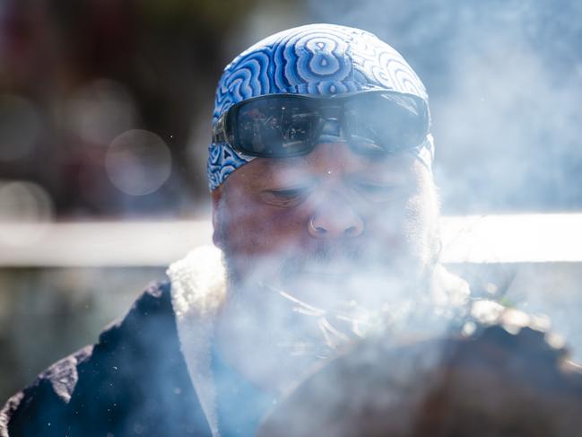 Jarowair Wakka Wakka man Conrad Bauwens conducts a Smoking Ceremony at the NAIDOC arts and craft market at Grand Central, Saturday, July 9, 2022. Picture: Kevin Farmer