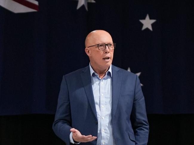 Peter Dutton says he will only stand in front of the Australian flag if he becomes Prime Minister.