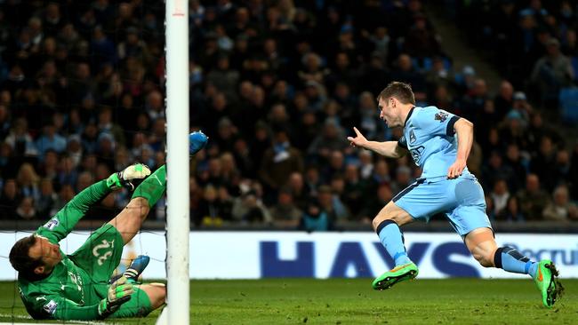 James Milner of Manchester City celebrates after scoring his team's second goal.