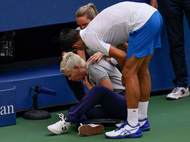 Line judge hit by ball from Novak Djokovic. Picture: Seth Wenig/AP