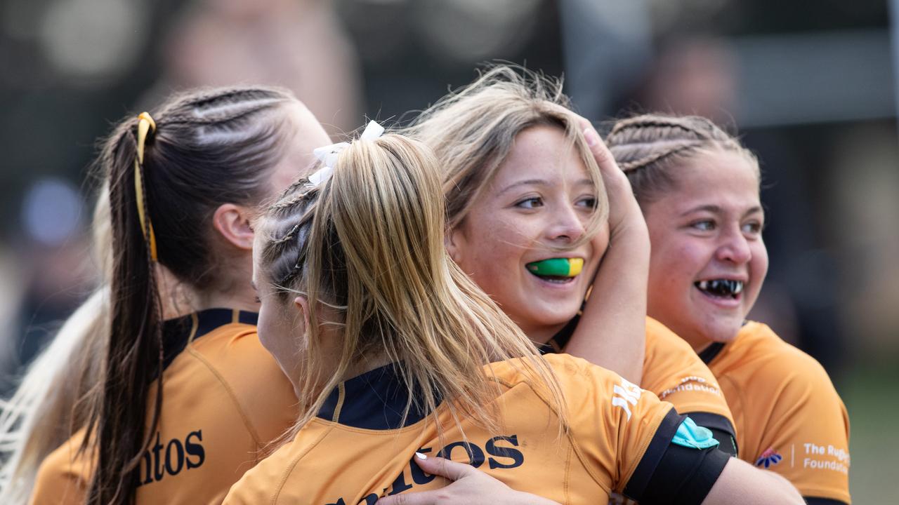 Maia Madden-Khan scores in the under 16 girls game. Picture: Julian Andrews